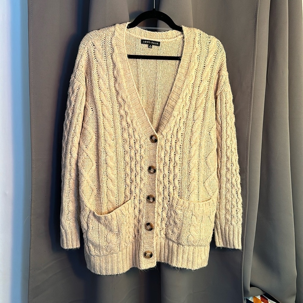 Button front cardigan with pockets.